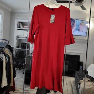 Red Dress with ruffle sleeve and hem.